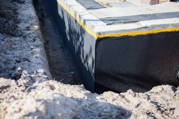 Professional Waterproofing technician working in Oakland, MI